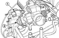 Расположение винтов крепления клапана контроля холостого хода (1) и датчика положения дроссельной заслонки (2)
